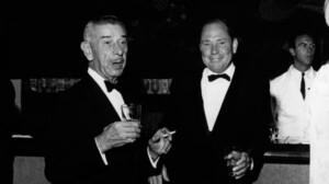 Johnny Mercer having cocktails with a colleague.