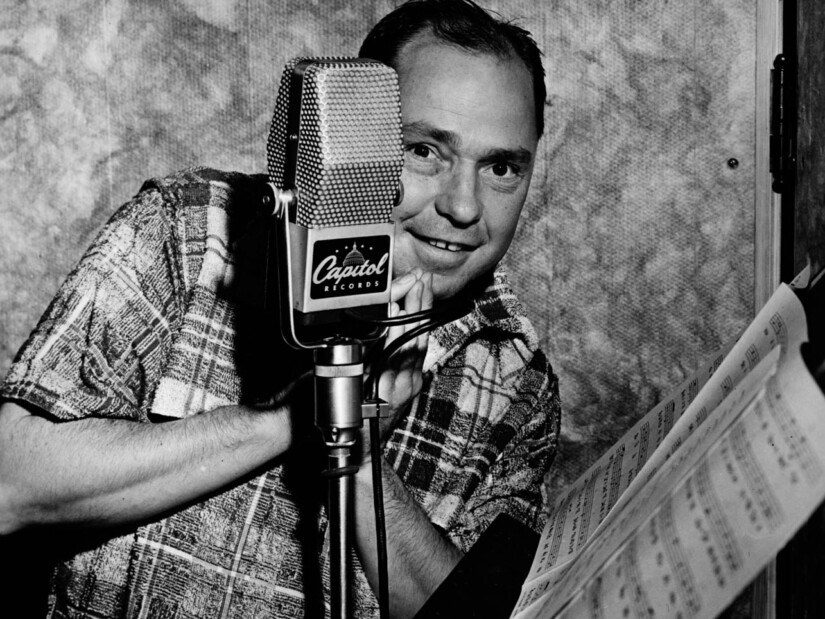 Johnny Mercer with a Capitol Records microphone.