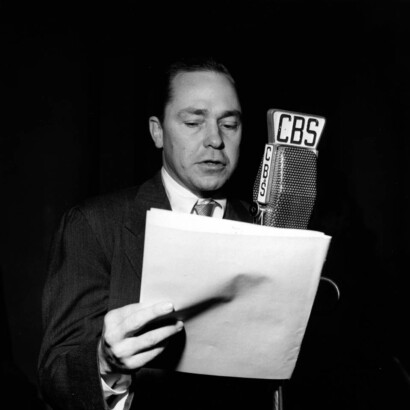 Johnny Mercer speaking into a CBD microphone.