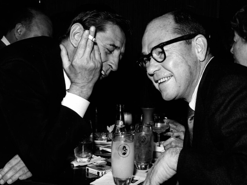 Johnny Mercer having drinks with a friend.