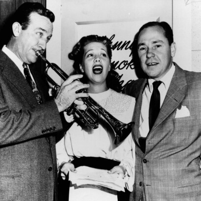 Johnny Mercer laughing with friends.