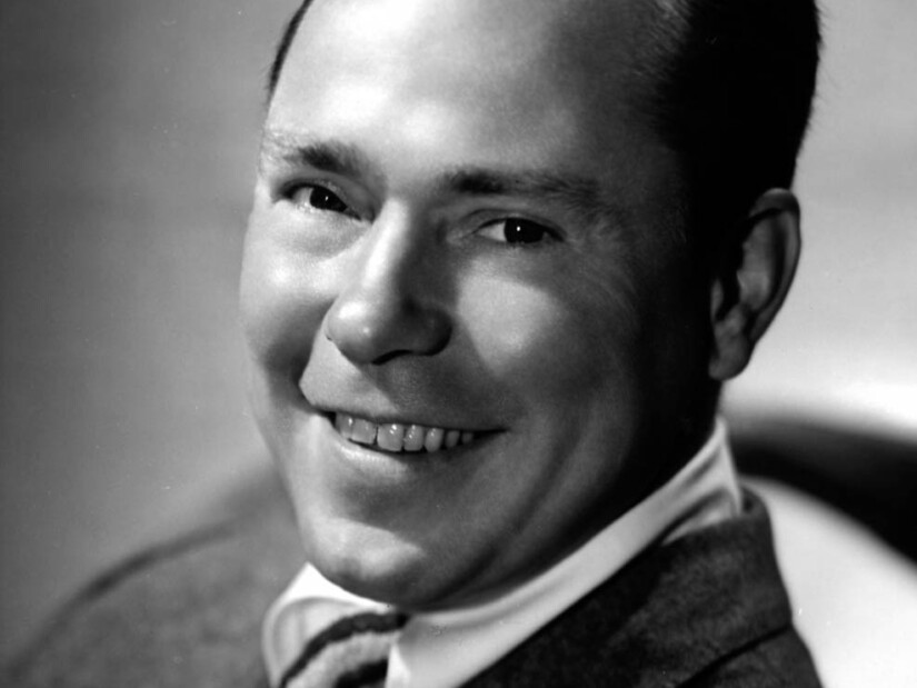 Johnny Mercer smiling.